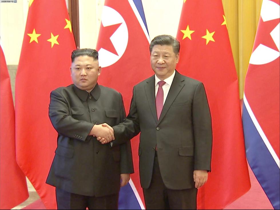 北韓領導人金正恩（左）與中國領導人習近平（右）。 圖：翻攝自新華網（資料照片）