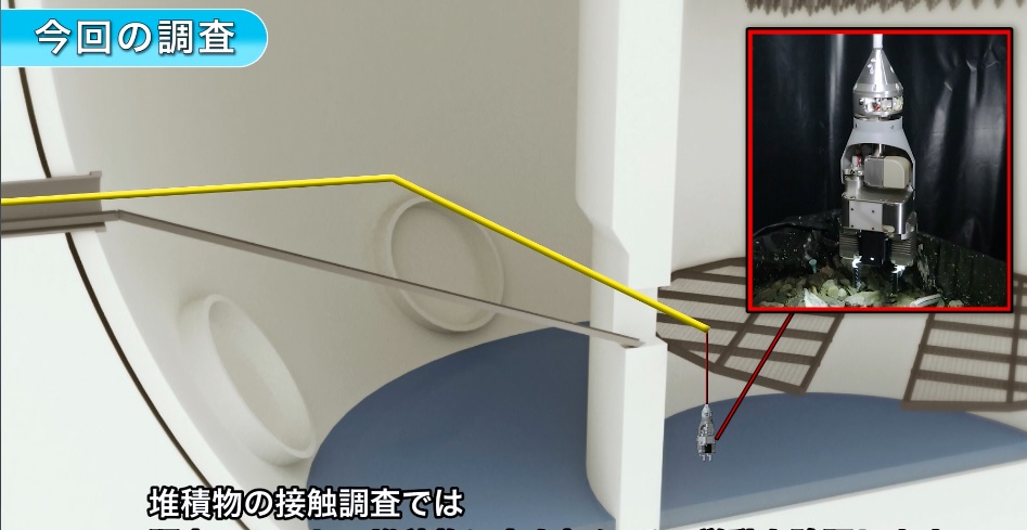 日本東京電力公司使用長達15公尺的機器手臂,伸入福島核災的第一電廠2號反應爐內,試圖收集已熔化的核廢料。 圖:翻攝自東京電力公司影片 日本東京電力公司使用長達15公尺的機器手臂,伸入福島核災的第一電廠2號反應爐內,試圖收集已熔化的核廢料。 圖:翻攝自東京電力公司影片