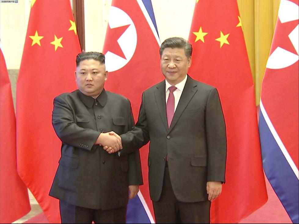 北韓領導人金正恩、中國國家主席習近平。 北韓領導人金正恩、中國國家主席習近平。