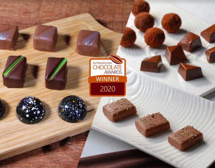 世界巧克力大賽(International Chocolate Awards, ICA)金牌獎的長榮桂冠酒店及長榮空廚綜合精裝巧克力禮盒。 圖:長榮集團/提供 世界巧克力大賽(International Chocolate Awards, ICA)金牌獎的長榮桂冠酒店及長榮空廚綜合精裝巧克力禮盒。 圖:長榮集團/提供