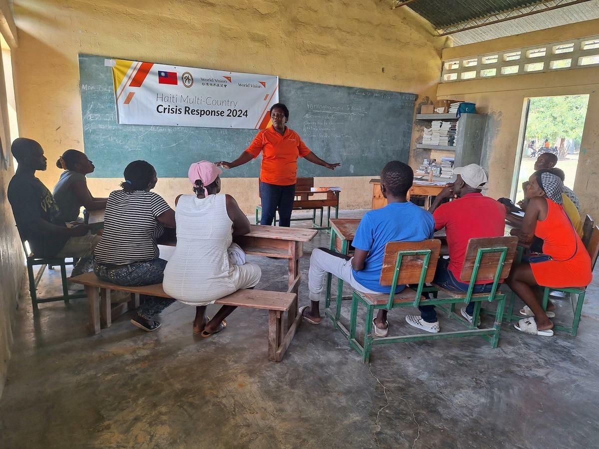  台灣世界展望會及外交部合力將糧食、民生物資，繞過大半地球送達沒有生存條件的海地百姓手中。 圖：台灣世界展望會提供 