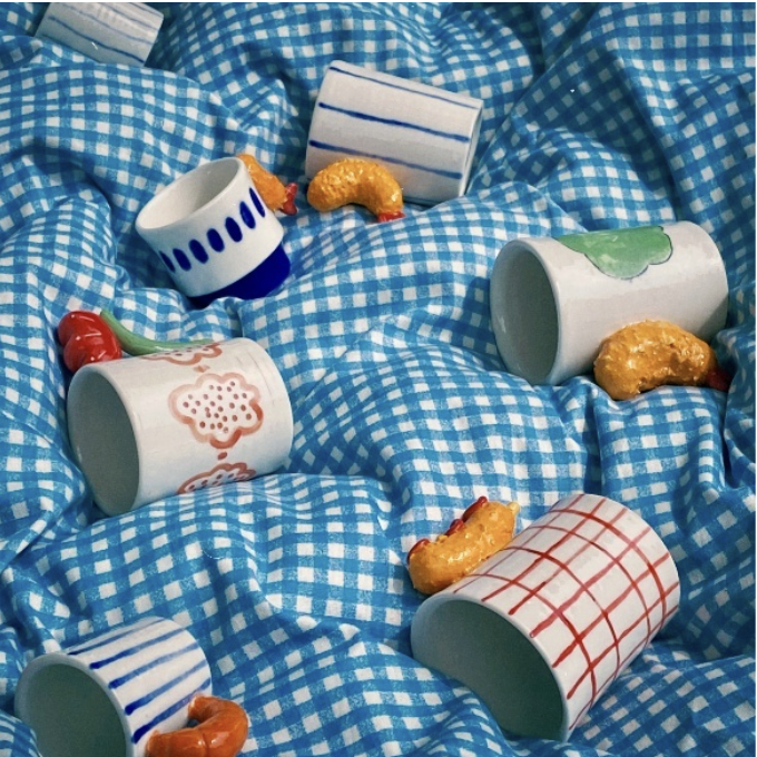  ▲泥睡芽的陶瓷杯以趣味十足的把手吸睛登場，從美式熱狗、香菇到冰淇淋，顛覆你對 「杯子」的想像。 圖：富邦金／提供 