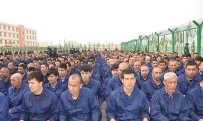 維吾爾人在新疆會被中國當局扔進「再教育營」。   圖：人權團體/提供