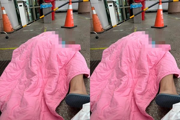 林姓男子Po出孩子全身癱軟在醫院地上的照片。   圖：翻攝爆料公社
