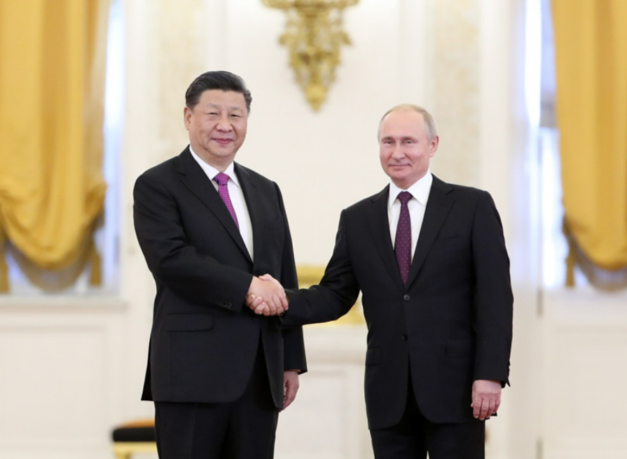 中國國家主席習近平（左）跟俄羅斯總統普丁。   圖：翻攝中國國防部（資料照）