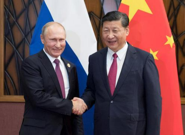 中俄關係向來緊密，圖右為俄羅斯總統普丁，圖左為中國國家主席習近平。   圖 : 翻攝自中新網