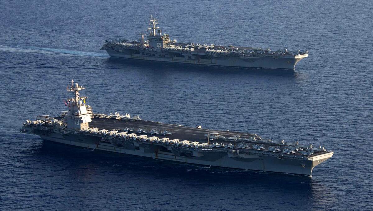  美海軍航母「福特號」與「艾森豪號」打擊群近日於東地中海展開聯演，除了是睽違 20 年來的首次，也展示對中東突發事件做出果斷反應的決心。 圖：擷取自「X」@NavalInstitute 