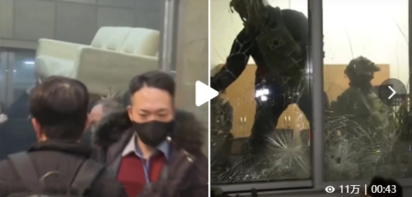  部分韓國軍人試圖打破玻璃窗，進入韓國國會。 圖 : 翻攝自影片截圖 