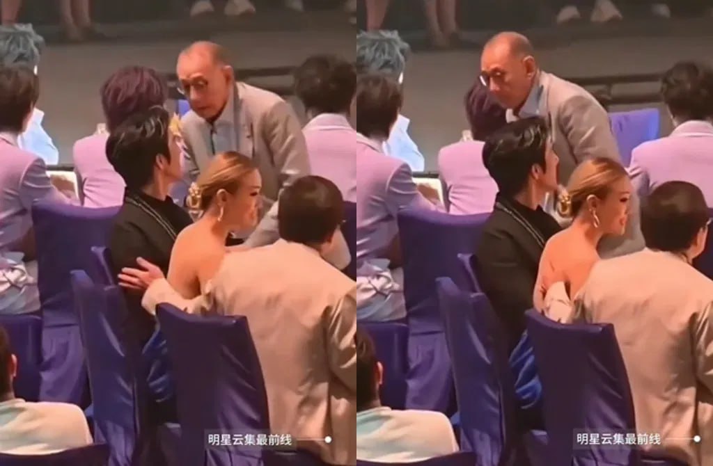 活動中一段畫面引發爭議：成龍被拍到伸手碰觸容祖兒背部，部分網友質疑舉止不妥。甄妮看完影片後直批，「這場晚會就像一面照妖鏡，台上台下的每張嘴臉都冷血得可怕」。 圖:翻攝自X帳號@58cB4AdDMjKCsOJ